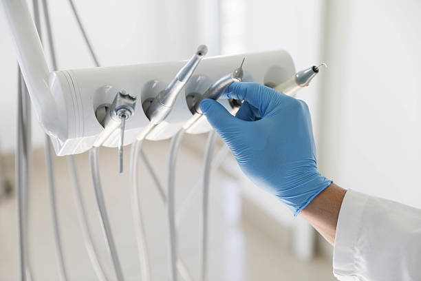 Professional Tooth Extraction technician working in Jonesville, MI